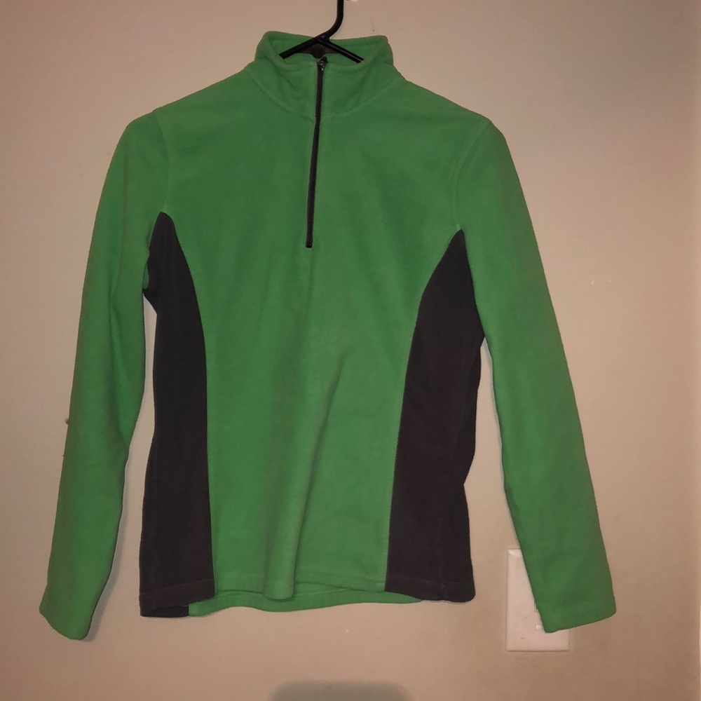 A green sweater zip up